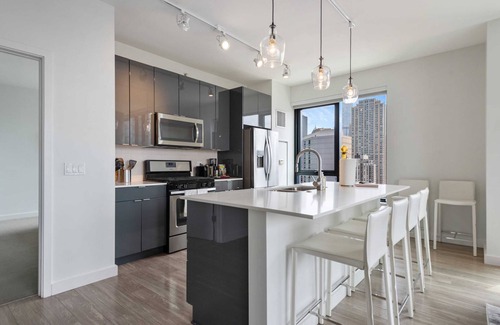 Rush and Division Apartment | Group Hub: 3 Designer 2BR, Steps to Mag Mile