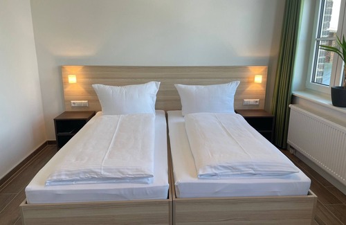 Pasewalk Bed & Breakfast | Guest house apartment 103 - Lokschuppen Pasewalk- guest houses with double rooms, single rooms and