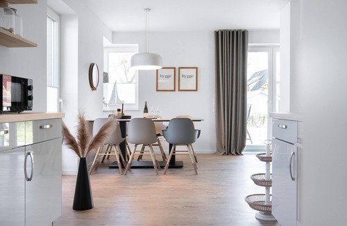 Butjadingen House | Haus Meerperle - Experience hygge. Sauna. Fireplace. Dogs welcome.