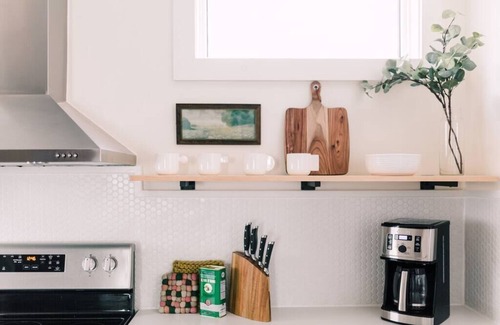 Prince Edward House | Harbour Main playful century home w/private patio