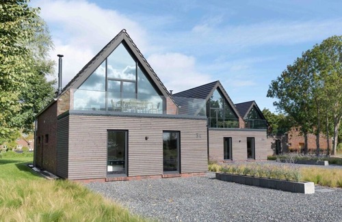 Neufunnixsiel House | Harlepadd 3c Modern retreat