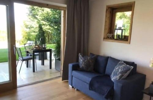 Sonnen Apartment | Haus Hochland - Moderne Alpenwohnung Garten&Natur