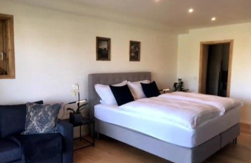 Sonnen Apartment | Haus Hochland - Moderne Alpenwohnung Garten&Natur