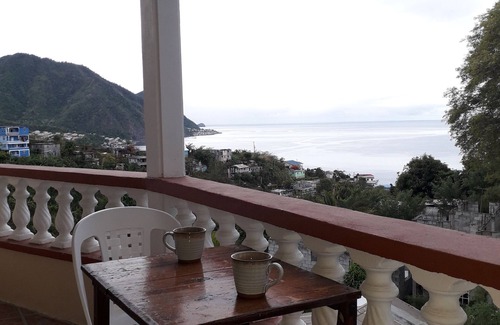 Roseau Apartment | HazelWood Cottage: Beautiful Caribbean Sea views, in a comfortable space.