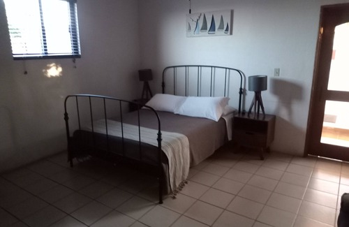 La Ribera Bed & Breakfast | HdP: Room #5 Budget Traveler with (2) queen size beds and sofa bed