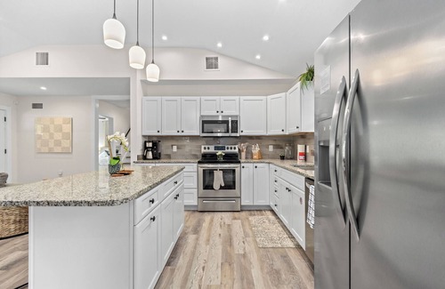 River District House | Heated Pool - Arcade - Pets - 2 King Beds - 75" TV - IMG - Near AMI