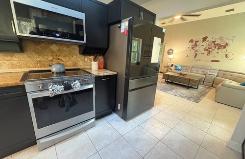 Palm Harbor House | Heated Pool Playful Turtle! 10 min. to beach! Pet Friendly!Lots of Activities