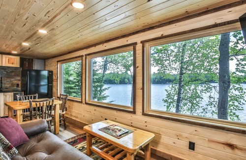 St Germain House | Heavenly lakeside cottage with fireplace, personal dock, and sandy beach!