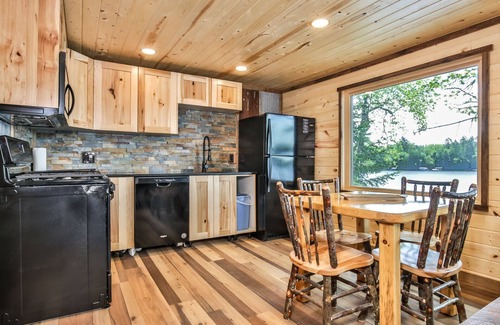 St Germain House | Heavenly lakeside cottage with fireplace, personal dock, and sandy beach!