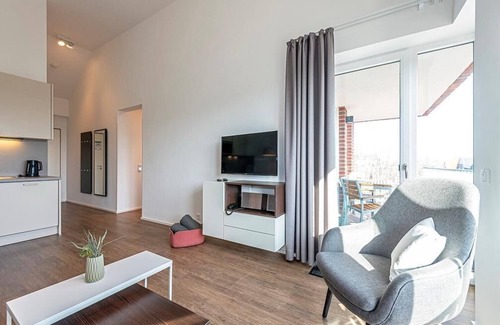 Langeoog Apartment | Helles Familienapartment in Strandnähe mit Sonniger Loggia und Sauna im Haus!