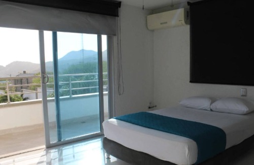 Comuna 3 Hotel | Hermosa Habitación Estándar Twin aA Pie De Playa