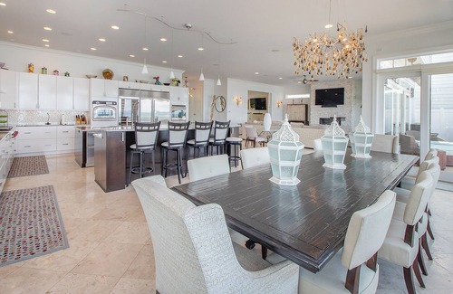 Grand Beach House | High-end lakefront home with poker table, infinity pool, pool table & WiFi