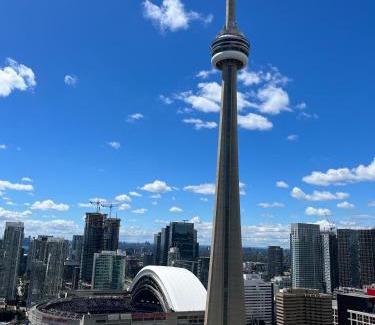 Toronto Entertainment District Apartment | High Rise Condo with Stunning Lake and CN tower view