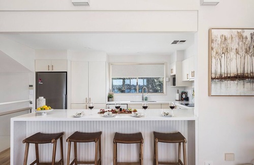 Salamander Bay House | High View Holiday House - Striking duplex with Heated pool and sea views