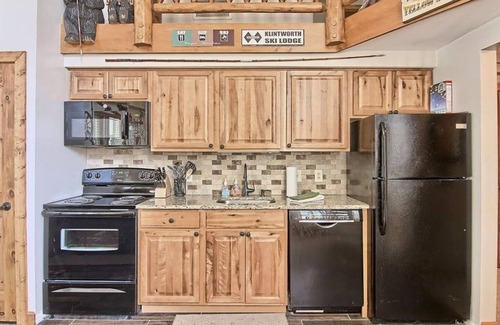 Boyne City Condo | Hillside: Sleeps 13: Golf Pool Lake