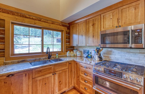 Estes Park Cabin | Historic cabin with mountain views, private W/D, & furnished deck