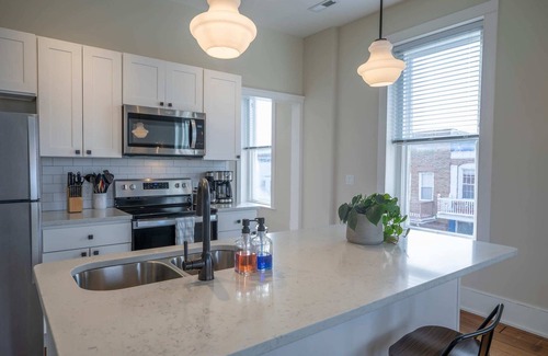 Floyd Apartment | Historic Farmer's Supply- DT Floyd Corner Apt #202