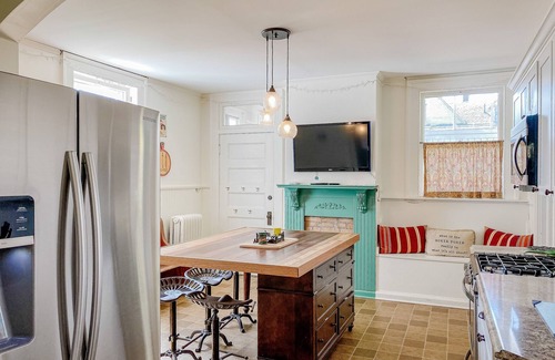 Manistee House | Historical dog-friendly home with fenced yard, grill, Ping-Pong, fireplace, & AC