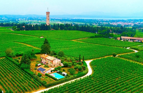 San Benedetto di Lugana Villa | Historical overlooking Lake Garda Villa with private park and swimming pool.