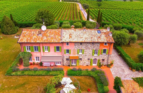 San Benedetto di Lugana Villa | Historical overlooking Lake Garda Villa with private park and swimming pool.