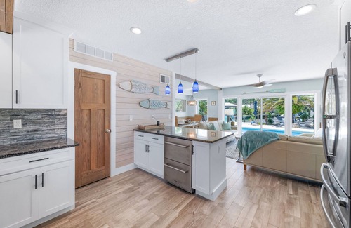 Butler Beach House | History By Day Heaven By Night Waterfront Pool Oasis, Kayaks/Bikes Make Memories