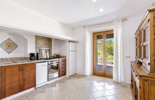 Sant Llorenc des Cardassar Villa | Holiday Home Ses Voltes with Mountain View, Wi-Fi, A/C, Pool, Garden & Terrace
