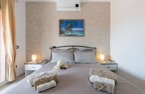 Eden Rock House | Holiday Home "Villa Libeccio" with Sea View, Garden & A/C