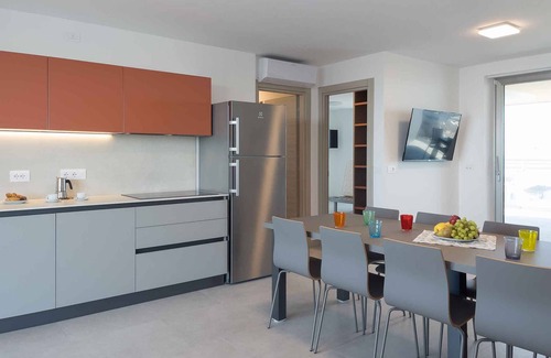 Lignano Sabbiadoro Apartment | Holiday apartment with balcony, air conditioning and internet