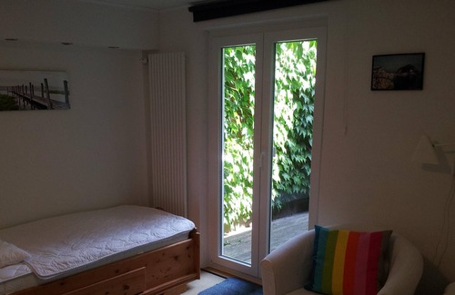 Leer Apartment | Holiday apartment, close to the old town in Leer, quiet, own terrace, WiFi, piano