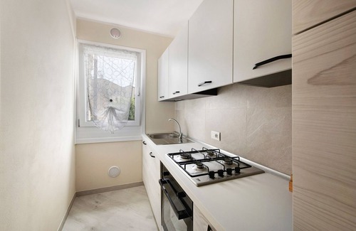 Albisano Apartment | Holiday Apartment "Casa Vera Aurora" with Lake View, Private Garden & Wi-Fi