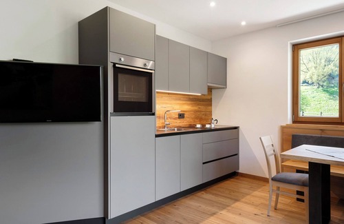 Villnoss Apartment | Holiday Apartment 'Baumannhof Apartment Ega' with Mountain View, Shared Terrace and Wi-Fi