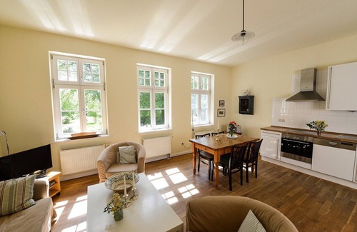 Grubnow Apartment | Holiday Apartment "Gut Grubnow Rügen - 2" with Lake View, Shared Garden & Wi-Fi