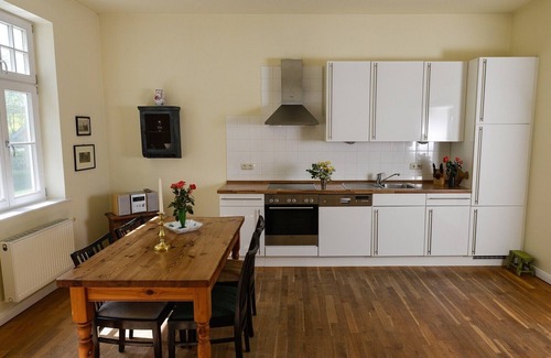 Grubnow Apartment | Holiday Apartment "Gut Grubnow Rügen - 2" with Lake View, Shared Garden & Wi-Fi