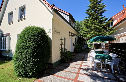 Wangerooge Apartment | Holiday Apartment 'Haus Seemumel, Fewo Unser Boot' with Private Garden and Wi-Fi