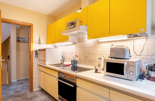 Fockbek Apartment | Holiday Apartment 'Lütt Stuv' with Private Terrace, Shared Garden and Wi-Fi