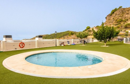 Enix Apartment | Holiday Apartment "Oasis En Enix" with Sea View, Shared Pool & Wi-Fi