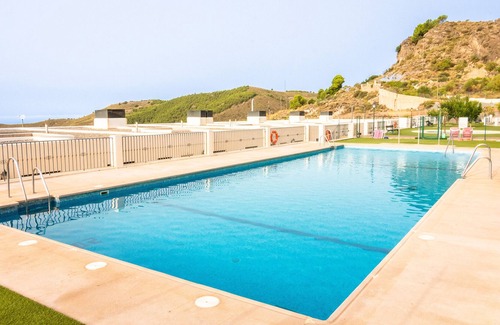 Enix Apartment | Holiday Apartment "Oasis En Enix" with Sea View, Shared Pool & Wi-Fi