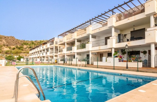 Enix Apartment | Holiday Apartment "Oasis En Enix" with Sea View, Shared Pool & Wi-Fi