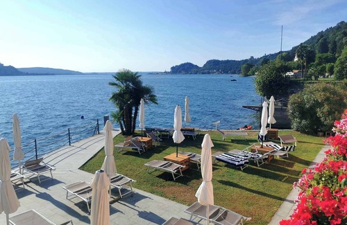 Meina Apartment | Holiday apartment with air conditioning, balcony and WLAN