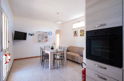 Torre Lapillo House | Holiday Home 'Aurea Retreat Lux' with Private Garden, Wi-Fi and Air Conditioning