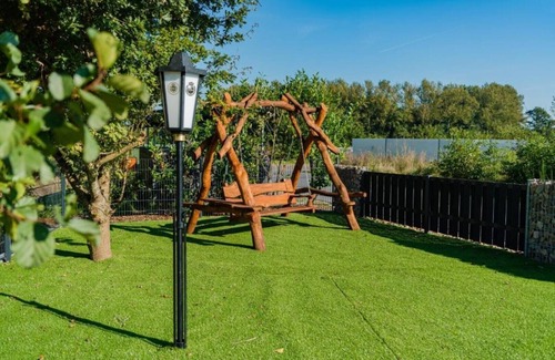 Barssel House | Holiday home "Borkum" with 88sqm - in the holiday park Harkebrügge