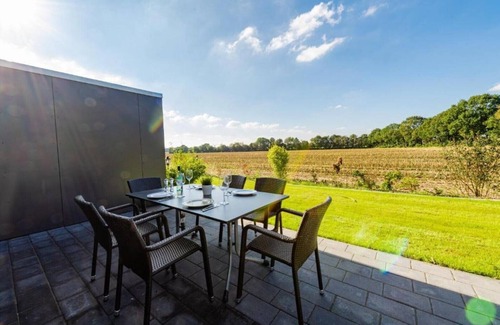 Barssel House | Holiday home "Borkum" with 88sqm - in the holiday park Harkebrügge