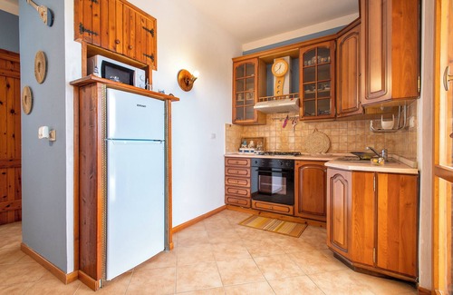 Centro Commerciale House | Holiday Home 'Casa In Residence Villa Marina' with Sea View, Shared Pool and Private Terrace