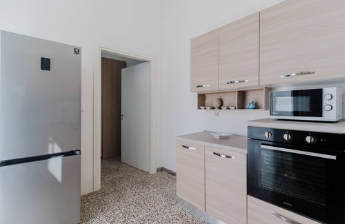 Torre Lapillo House | Holiday Home 'Casa Augusto' with Sea View, Private Garden and Air Conditioning