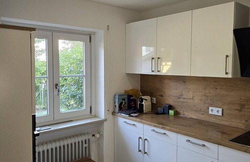 Prien am Chiemsee House | Holiday Home 'Charmantes Haus Mit Eigenem Garten' with Private Terrace, Private Garden and Wi-Fi
