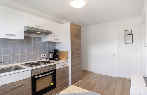 Eslohe House | Holiday Home 'Grobbel' with Private Terrace, Private Garden and Wi-Fi