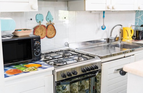 Villasimius House | Holiday Home 'Holiday In Villasimius' with Sea View, Wi-Fi and Air Conditioning
