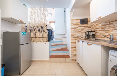 Campulongu House | Holiday Home 'Il Corbezzolo' with Sea View, Private Terrace and Air Conditioning