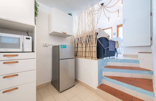 Campulongu House | Holiday Home 'Il Corbezzolo' with Sea View, Private Terrace and Air Conditioning