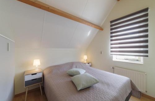 Wemeldinge House | Holiday Home in Quiet Park with Garden